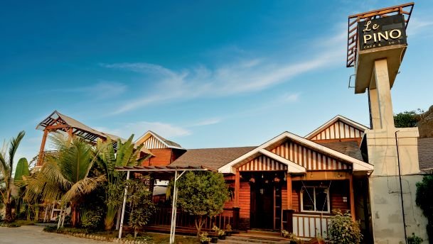 Le Pino Resorts wooden exterior facade in daylight
