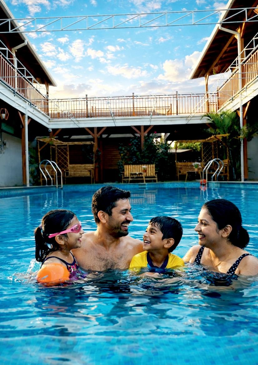 Family enjoying the pool at Le Pino Resorts