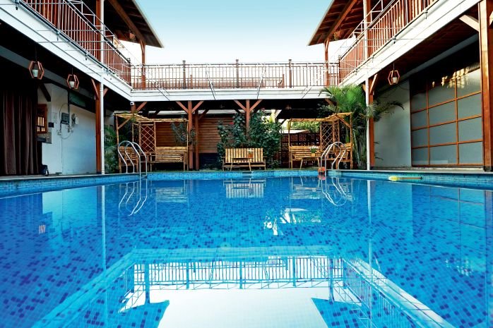 Le Pino Resorts pool courtyard at night